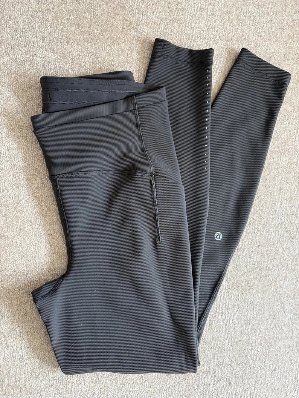 lululemon athletica leggings with pockets and subtle reflective dots